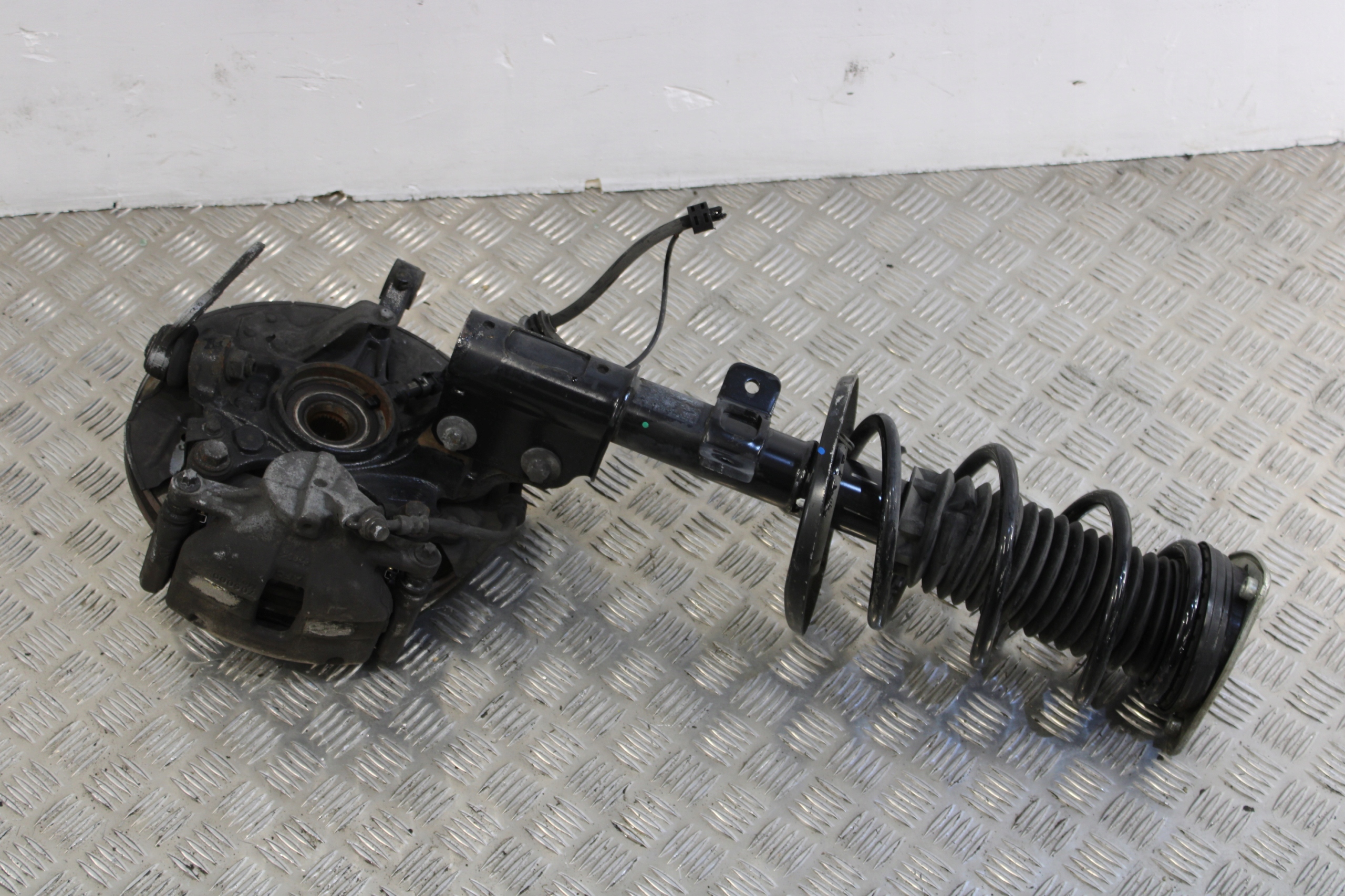 swing McPherson shock absorber left front OPEL COMBO E 1,6 CDTI