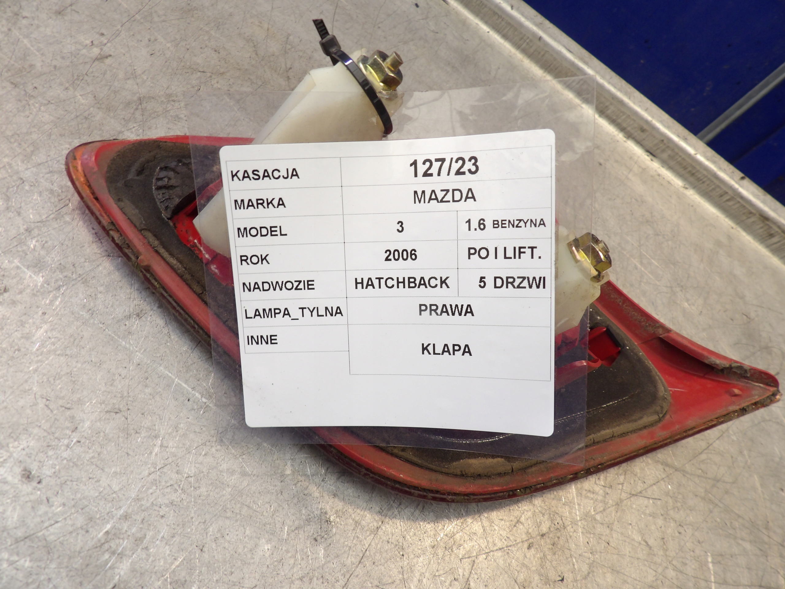 light TP trunk door Mazda 3 1,6B P2913
