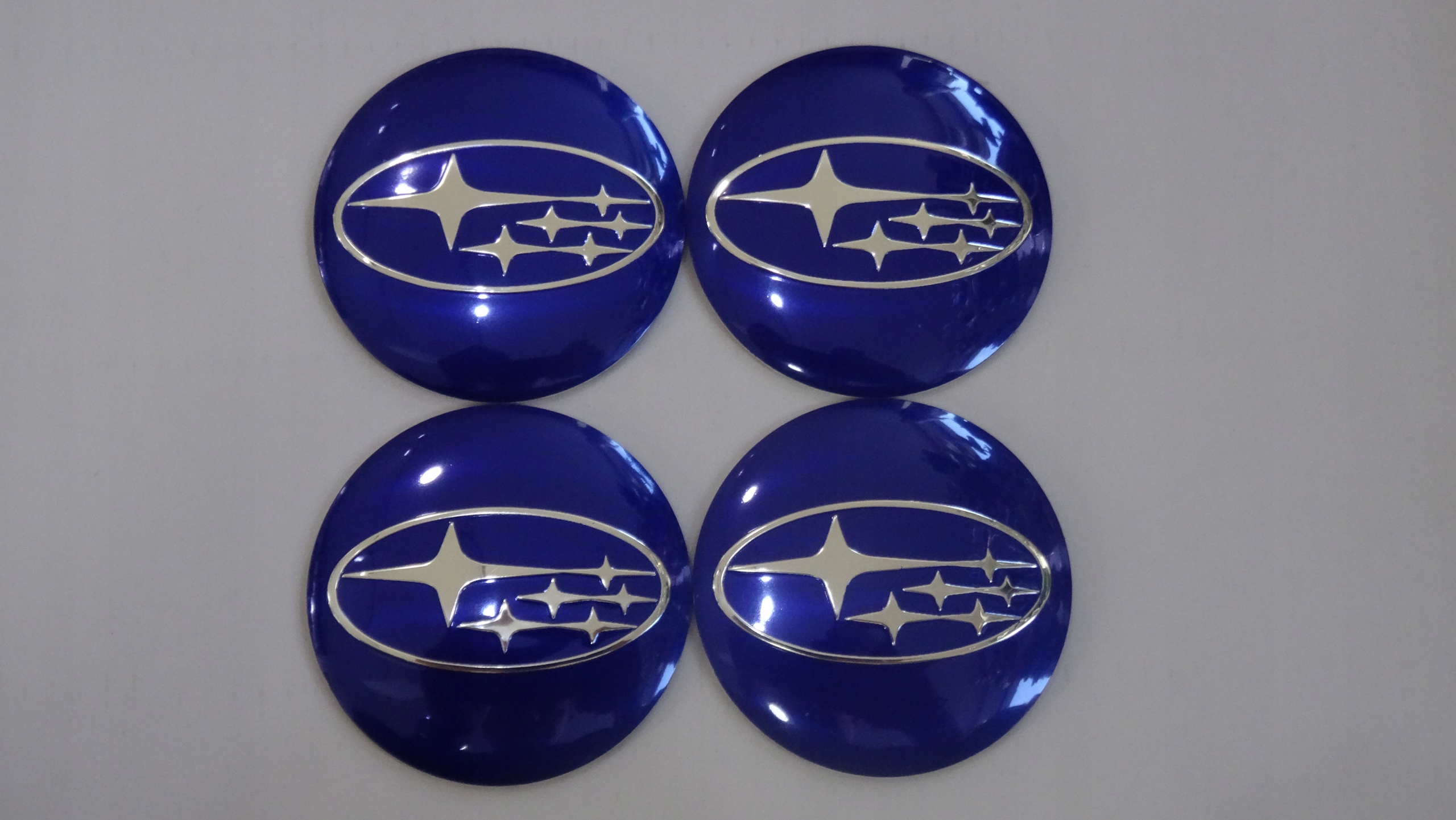 

4x Aluminiowe naklejki na dekielki Subaru 56mm nb