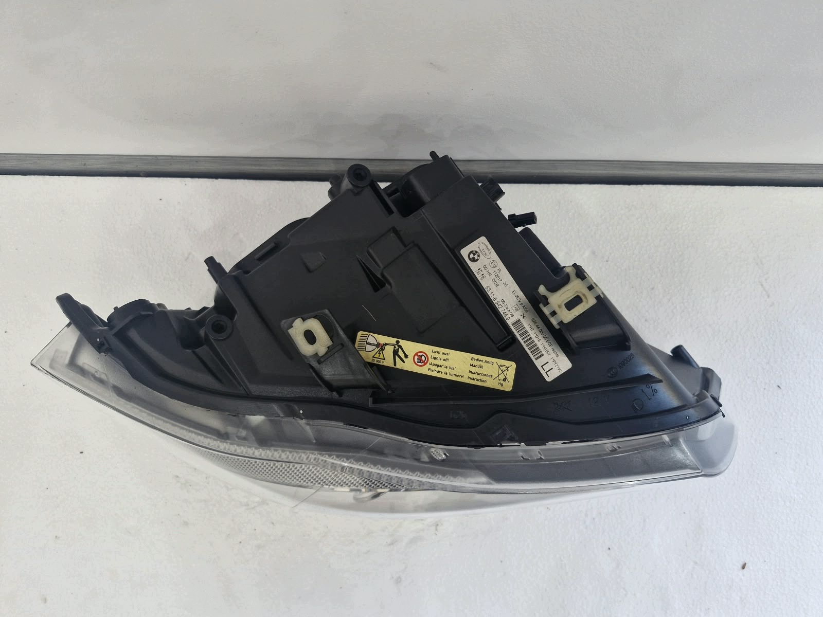 light right BMW E90 E91 pre facelift Bi-Xenon positioning