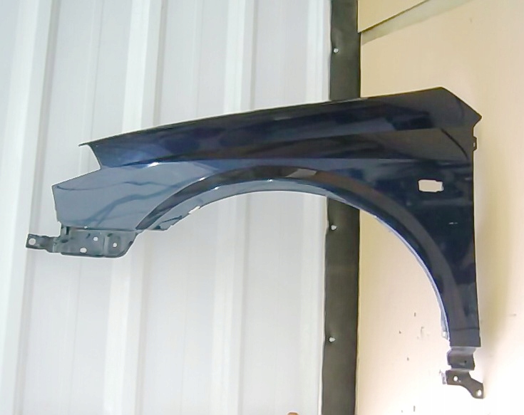 NISSAN PRIMERA P12 BŁOTNIK PRZEDNI LEWY