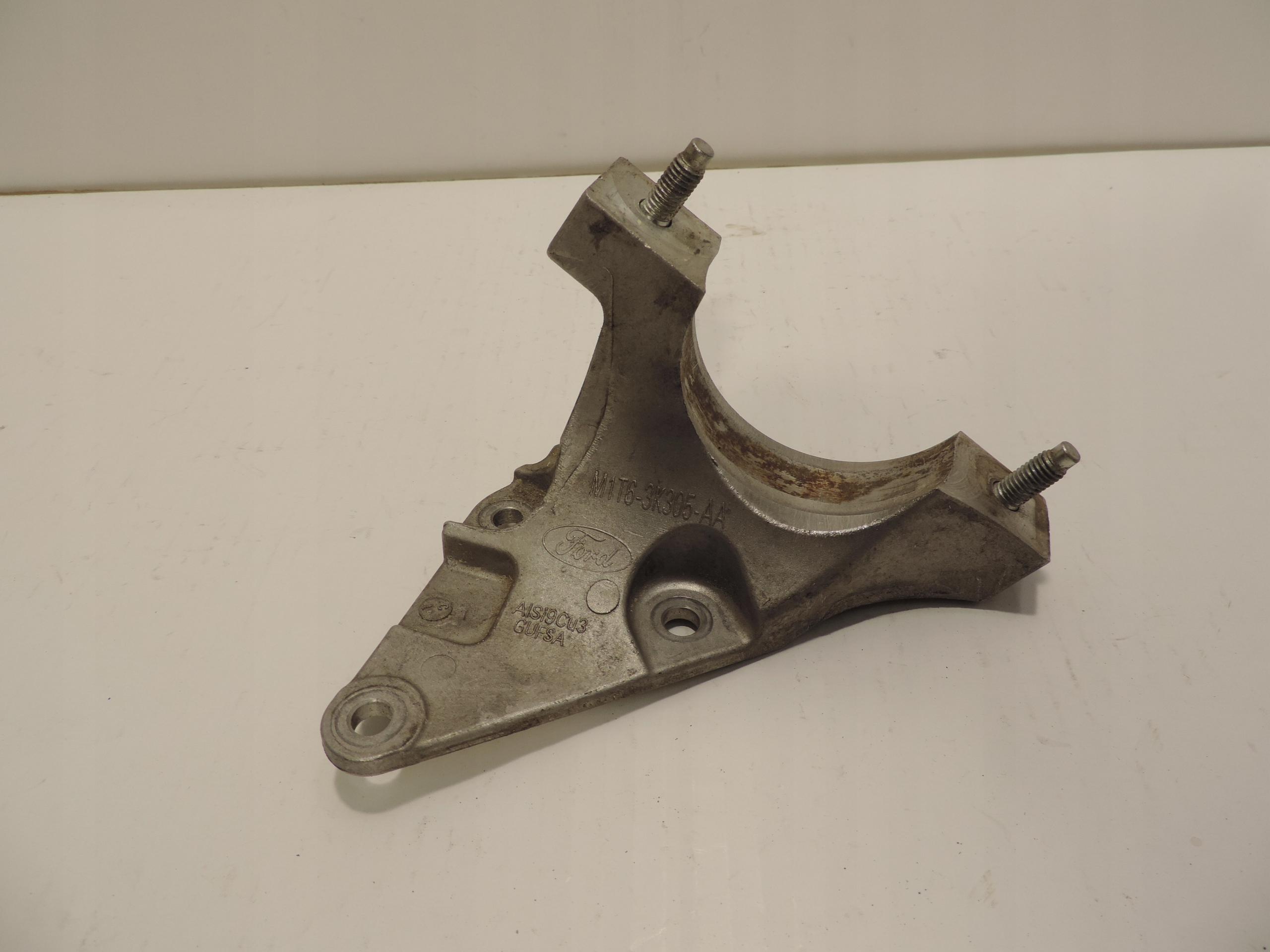 PODPORA PÓŁOŚI ŁAPA M1T6-3K305-AA FORD PUMA MK2 1,0