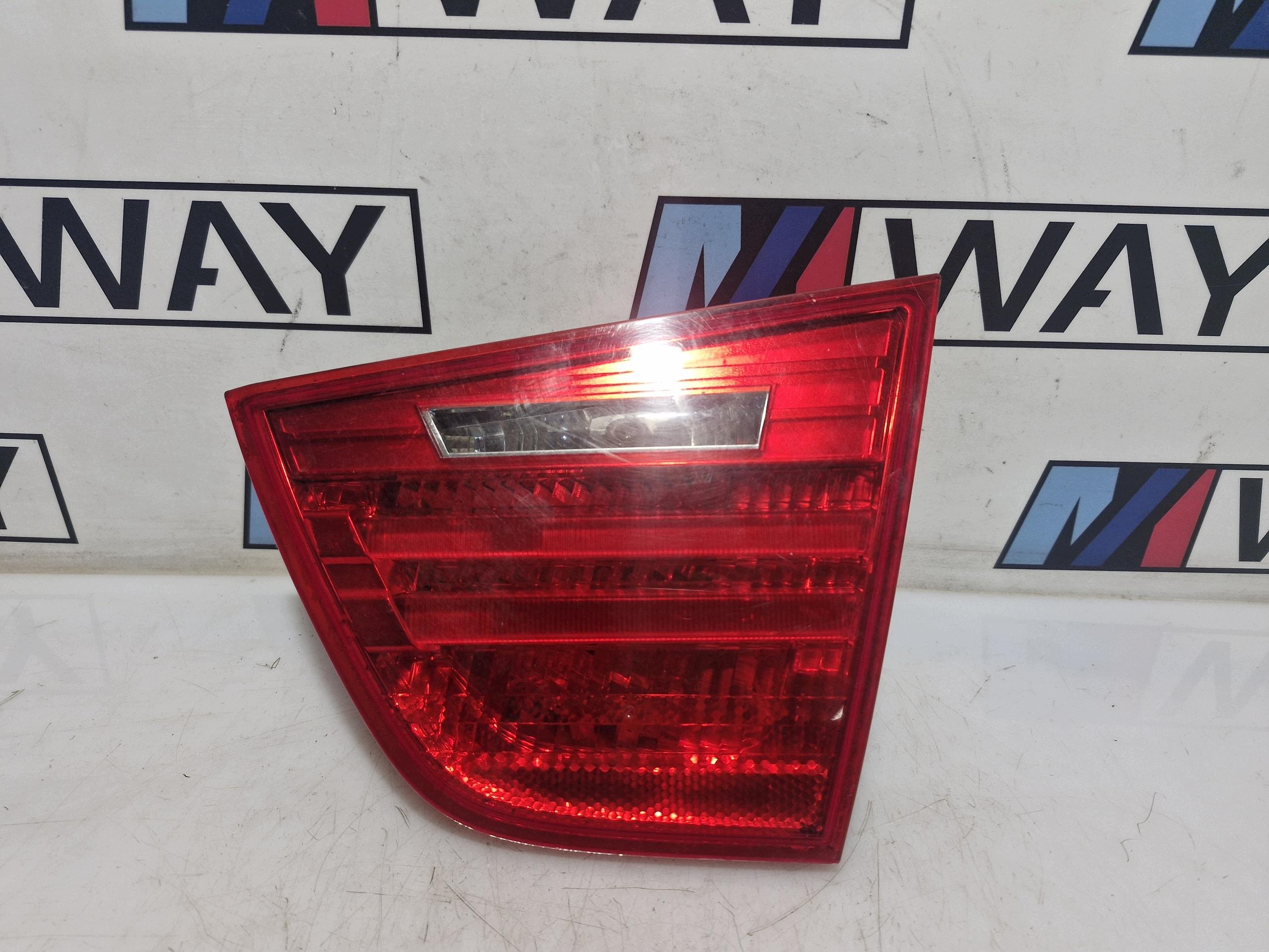 7154162 BMW E91 light rear part right to the bonnet boot original
