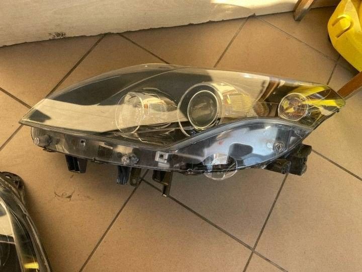 Reflektor light front side left Renault Laguna III GT
