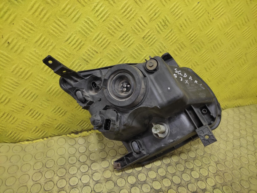 SUBARU JUSTY G3X REFLEKTOR fanale faro sinistra anteriore
