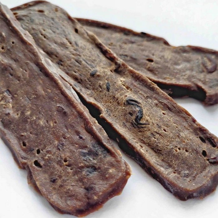 Levně Jehněčí maso s bachorem pamlsek pro psy bez obilovin na alergii XL 1 kg