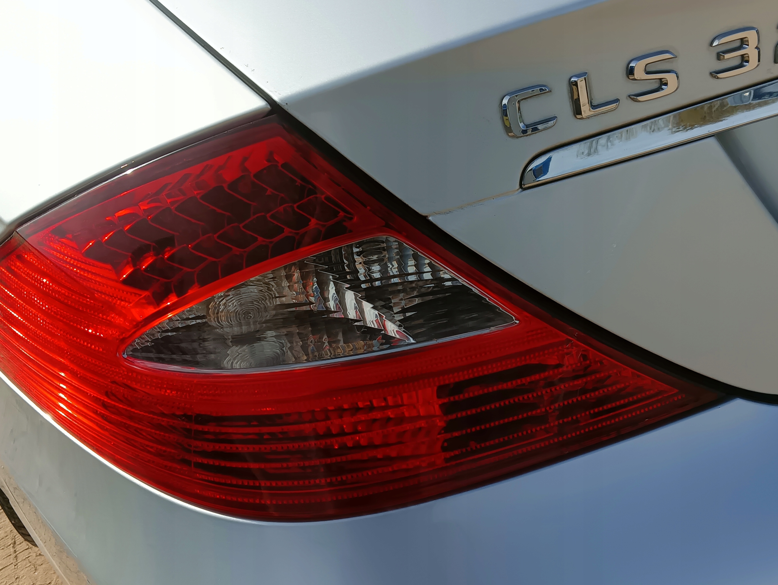 фонарь левый задний MERCEDES CLS W219