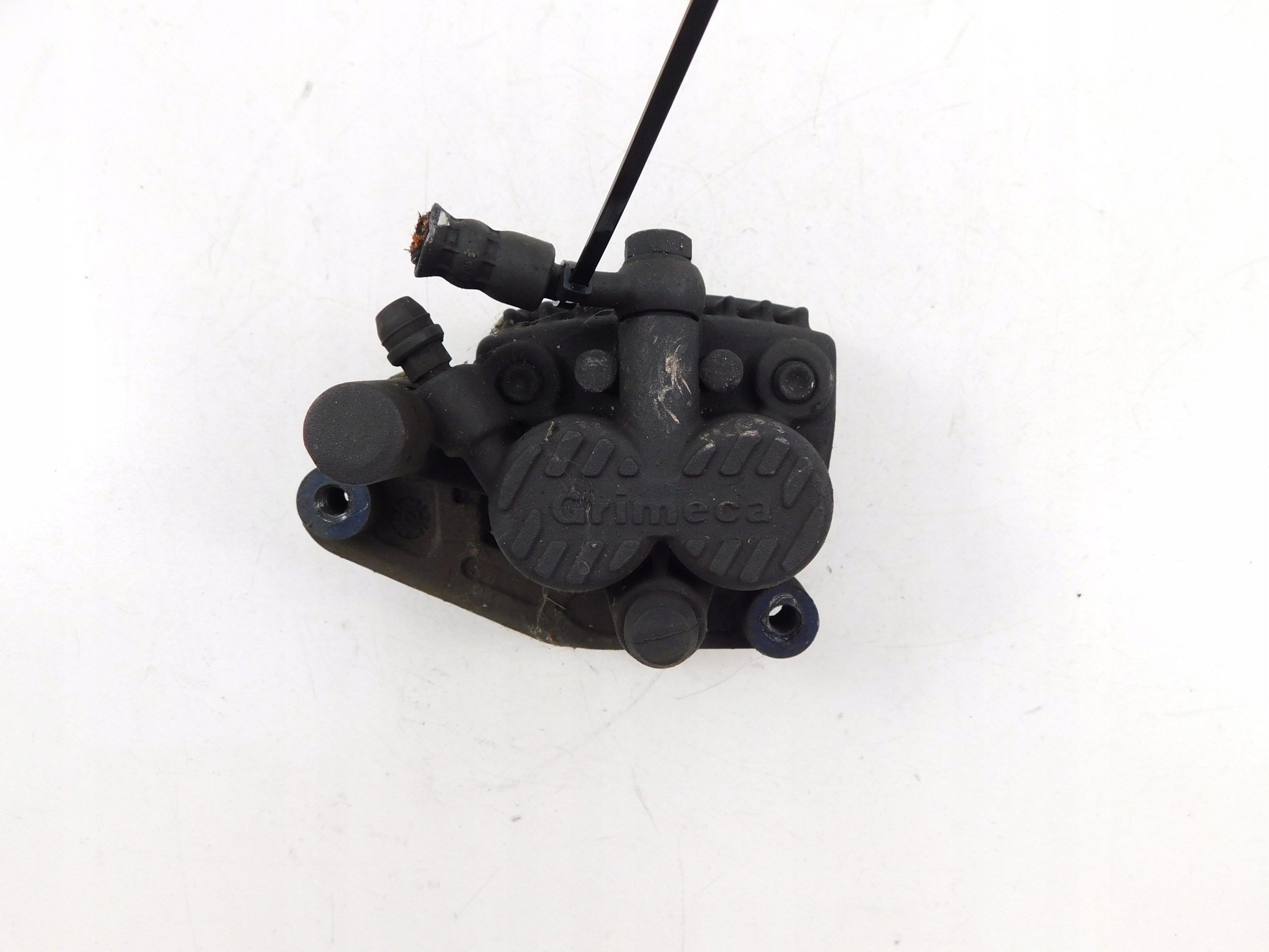 APRILIA SCARABEO 500 ZACISK HAMULCA PRZÓD LEWY