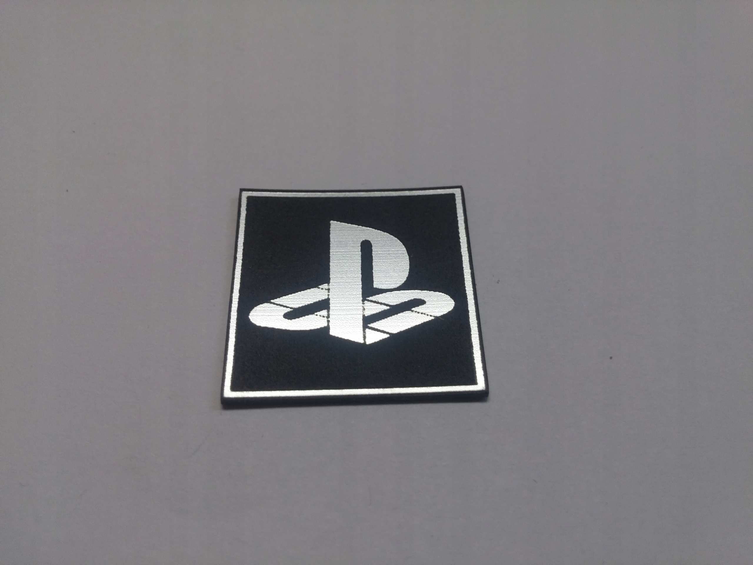 

Playstation naklejka emblemat 29 x 29 mm *srebrna