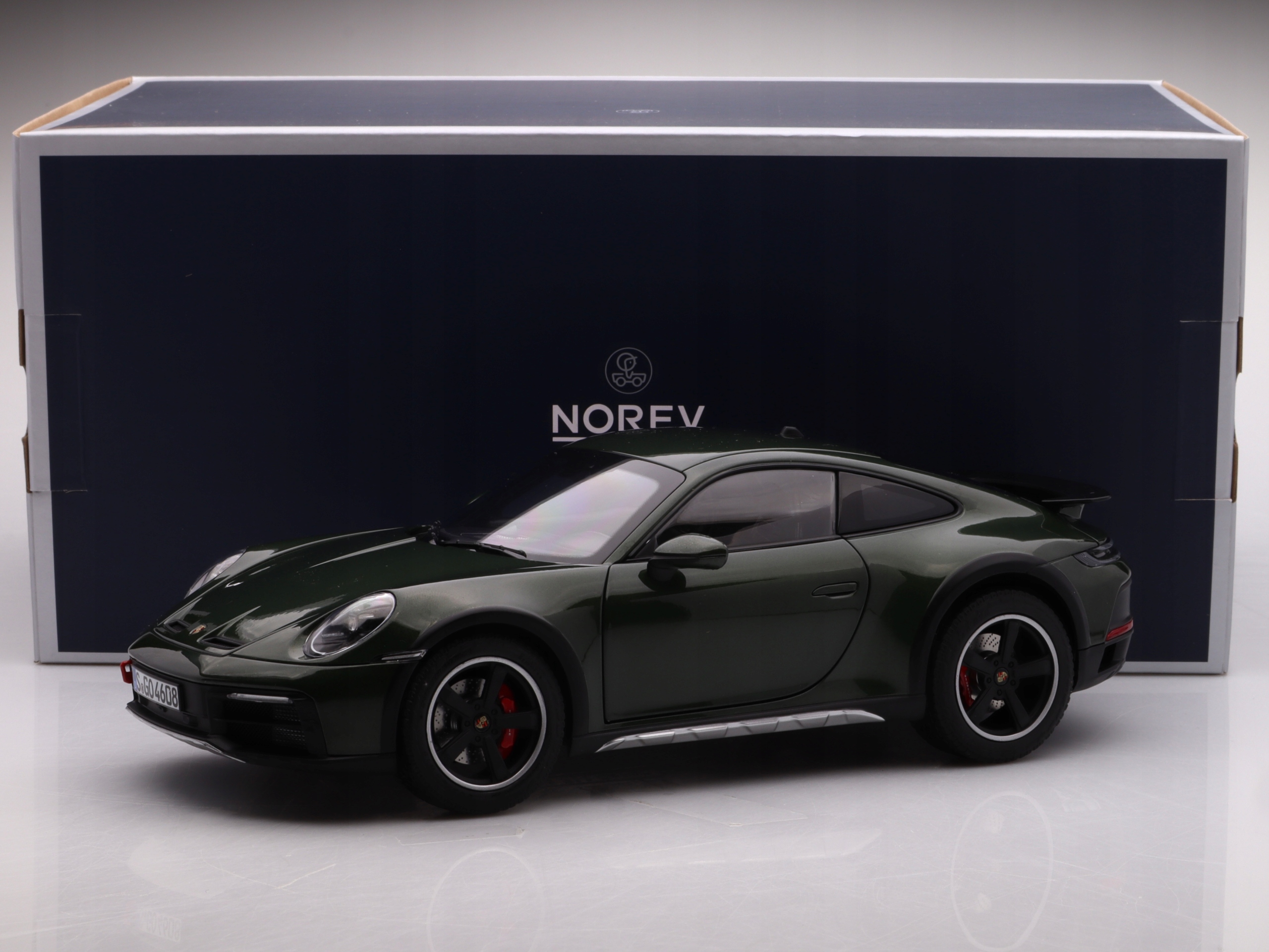 Porsche 911 Dakar 2023, green Norev 1:18