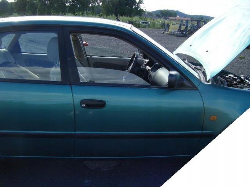 TOYOTA COROLLA E11 ZAMEK PRAWY PRZEDNI