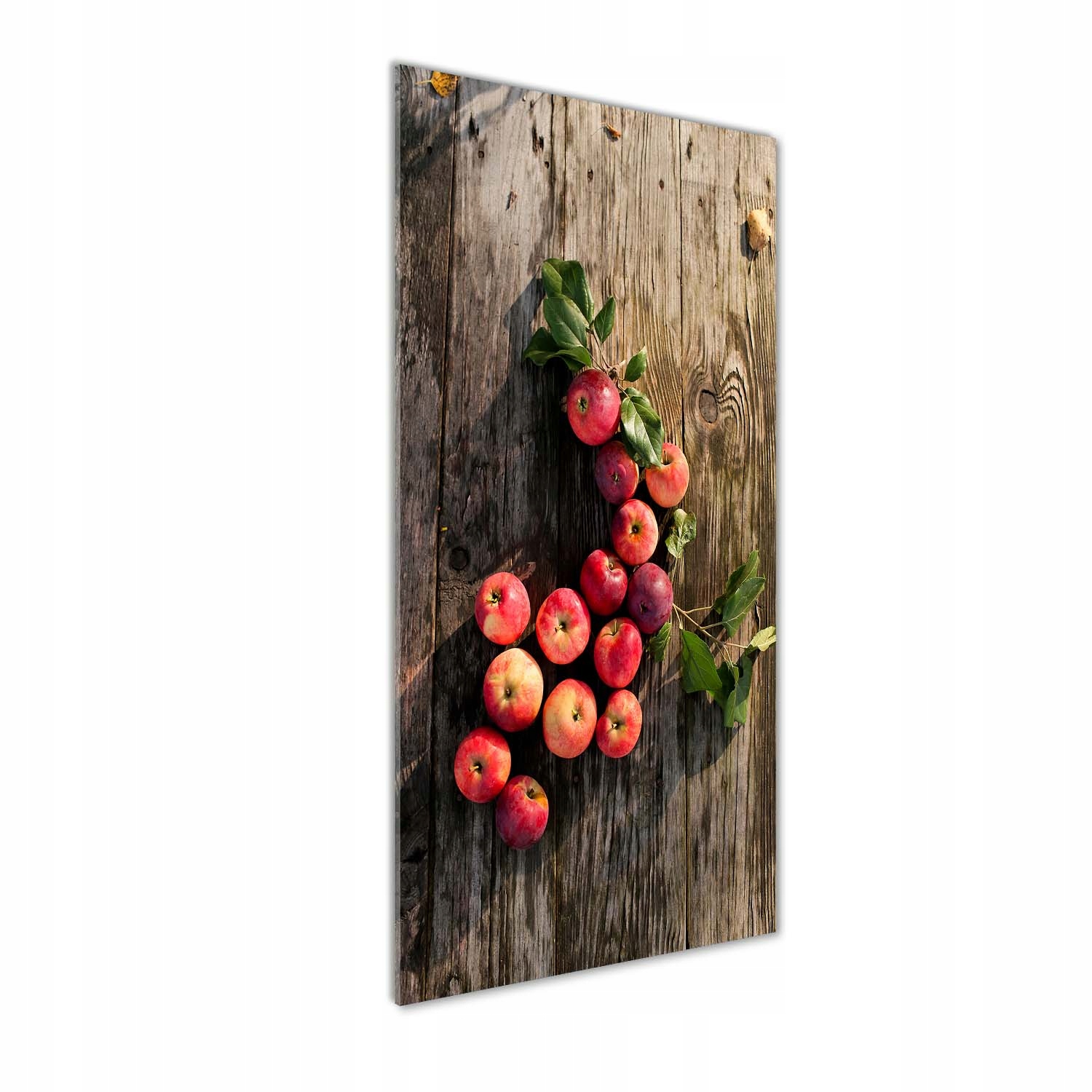 

Foto obraz szkło akrylowe Jabłka na stole 50x125cm