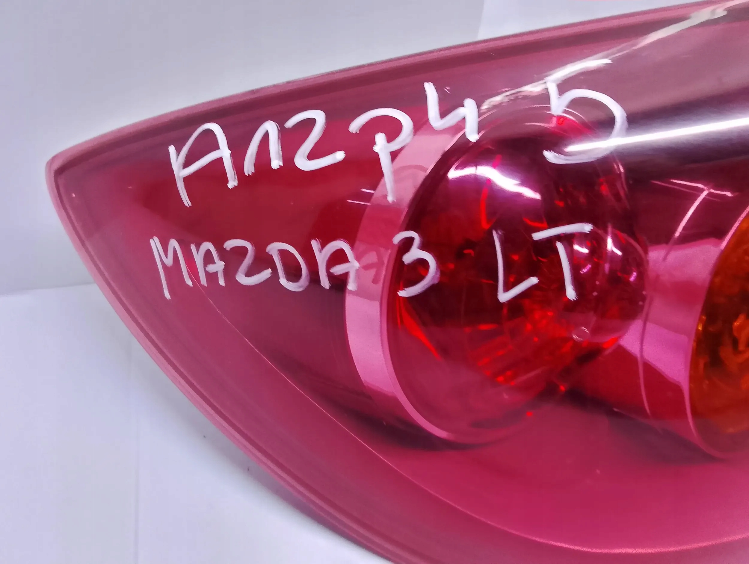 Mazda 3 and 2003 lights rear. 7443