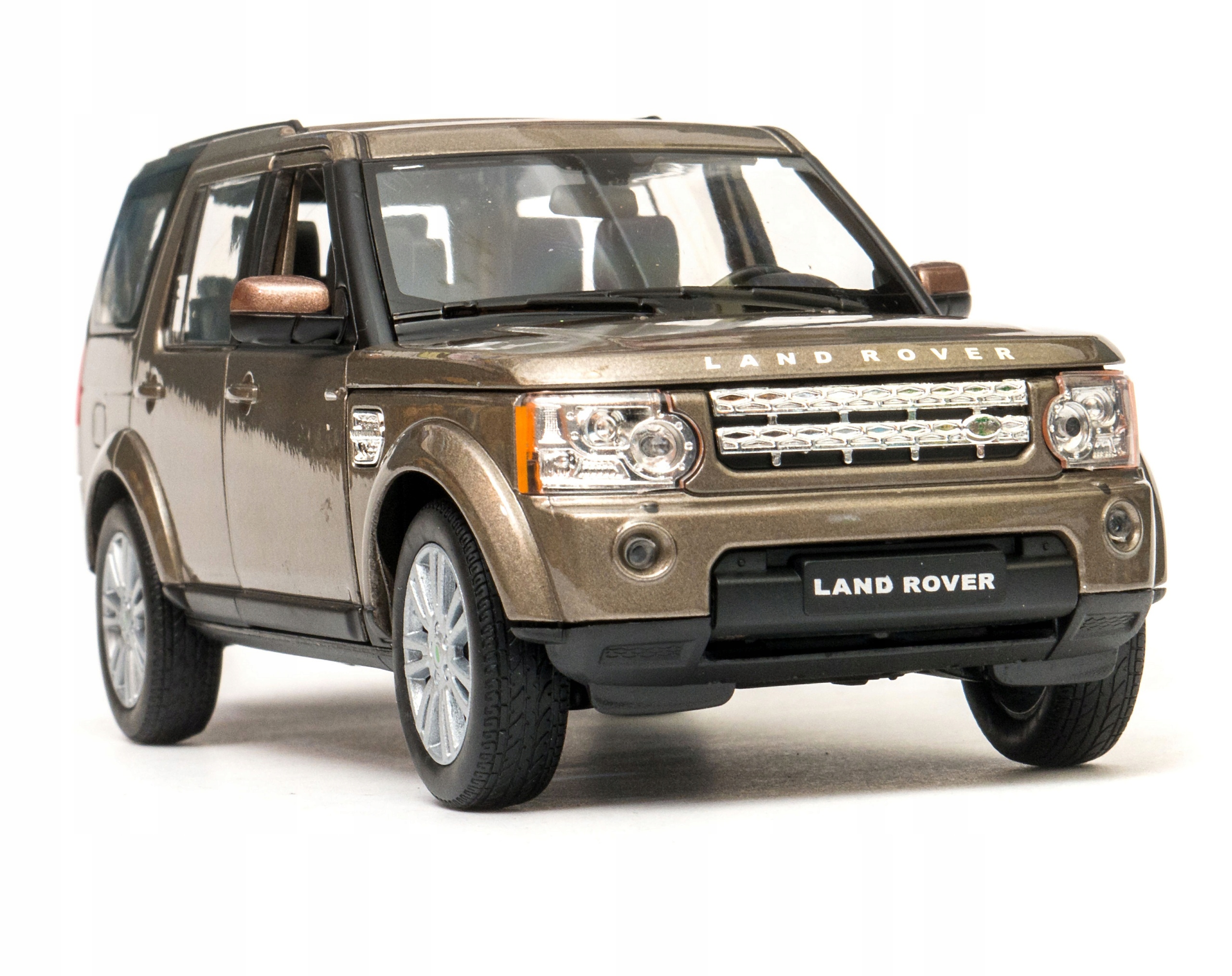 Land Rover Discovery 4 1:24 Welly 24008W hnědá
