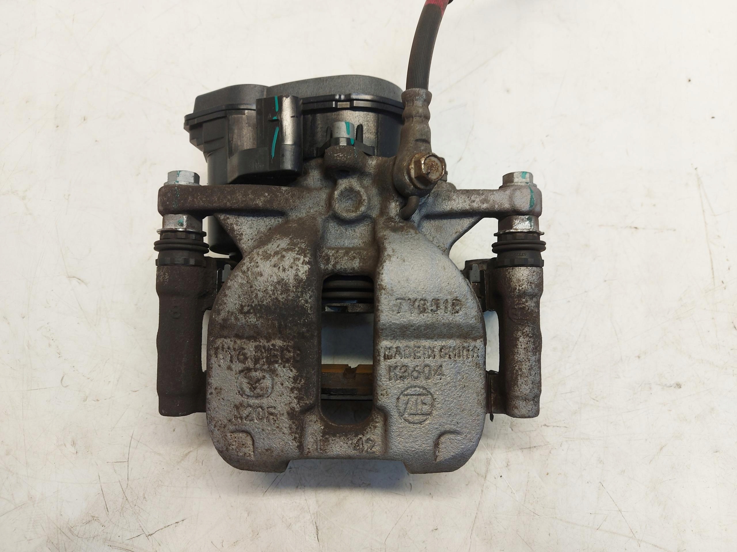Mazda CX60 2023r caliper brake left rear part rear oryg