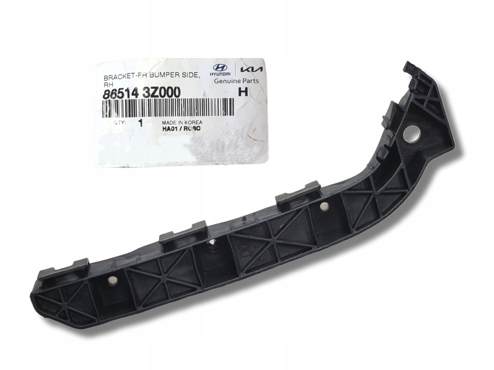 865143Z000 - HYUNDAI I40 кронштейн скольжения бампера передний правый OE