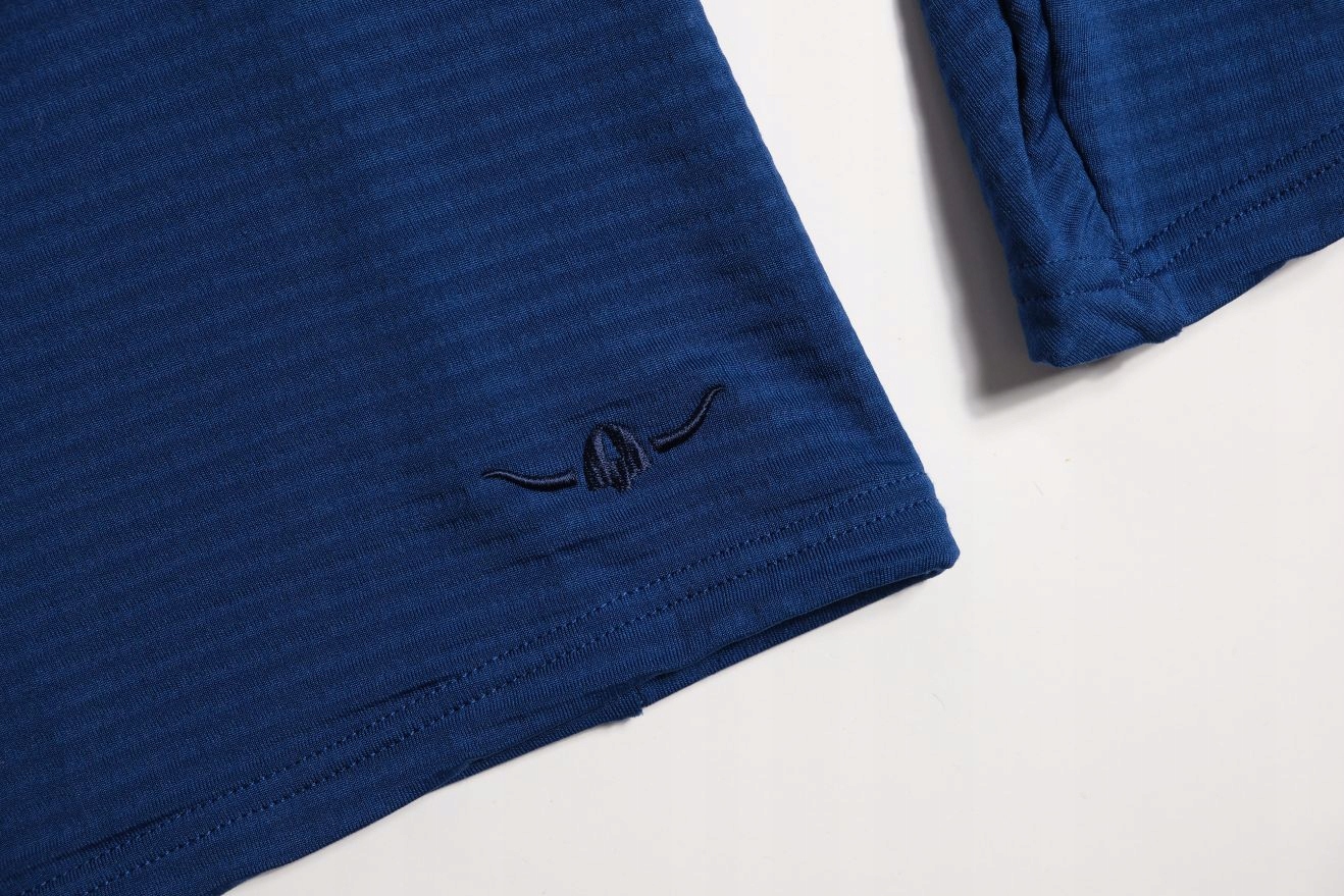 KAIKKIALLA__LEKKA OCIEPLANA BLUZA MĘSKA OUTDOOR__M Kolor niebieski