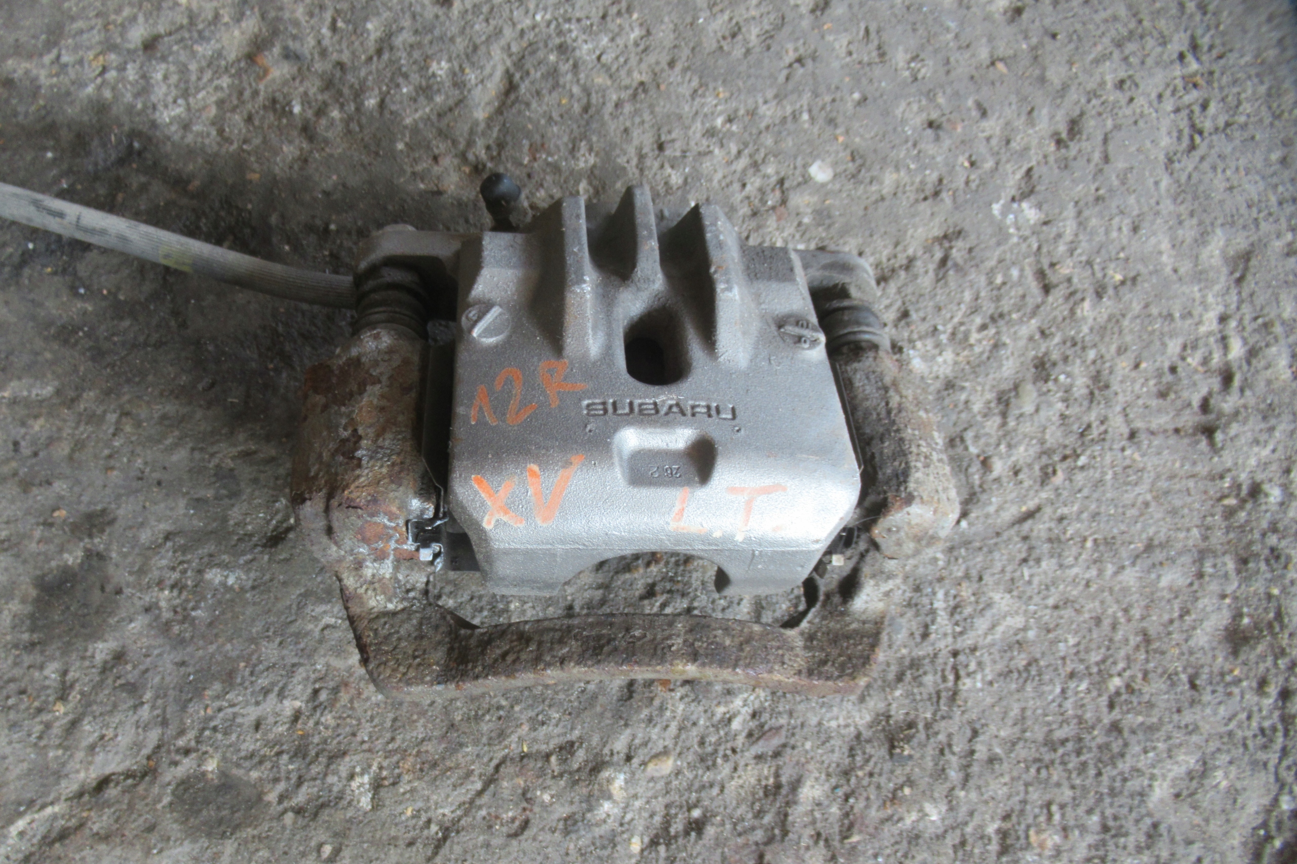 SUBARU XV 2.0D 12R caliper left rear part