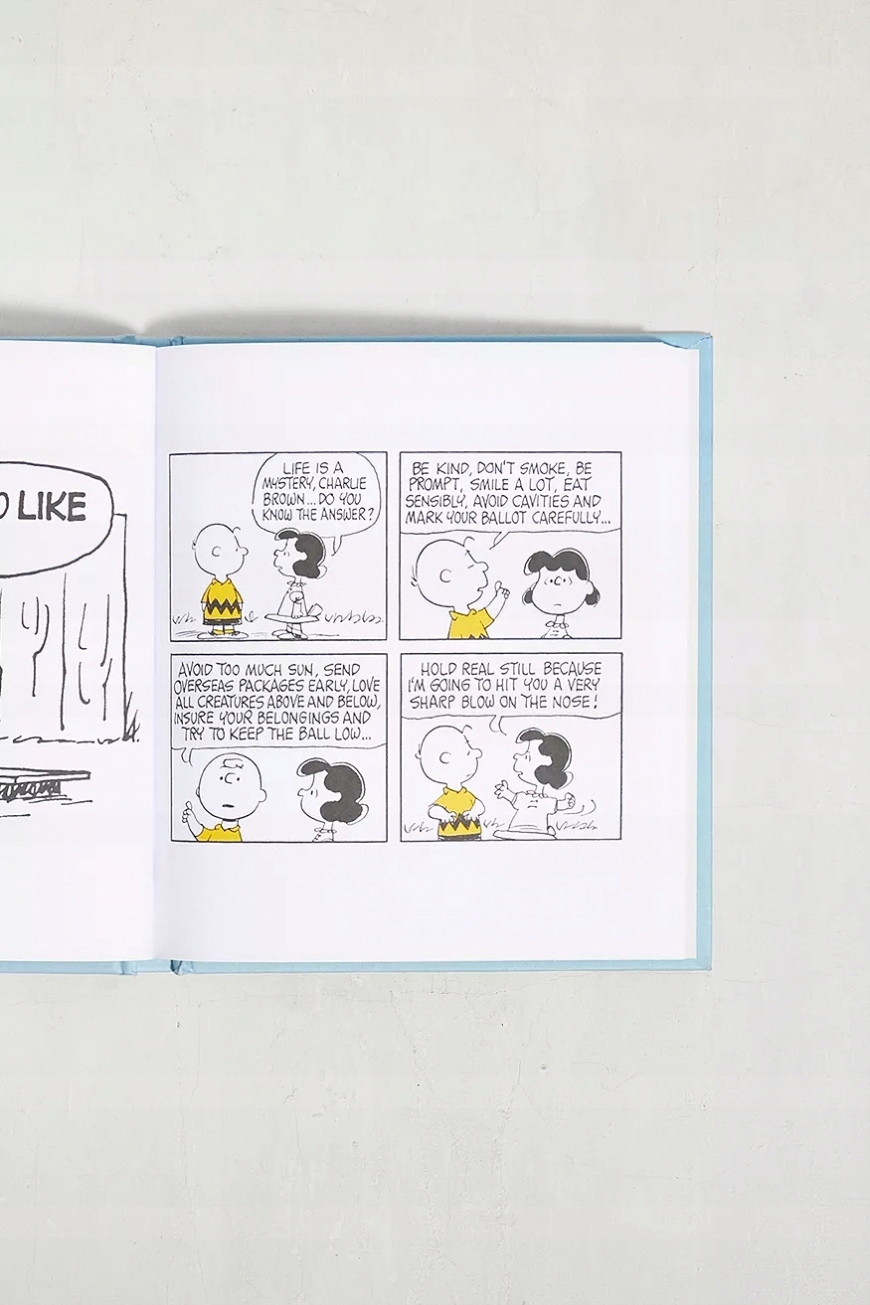 CHARLES M. SCHULZ- THE GENIUS OF CHARLIE BROWN Nośnik książka papierowa