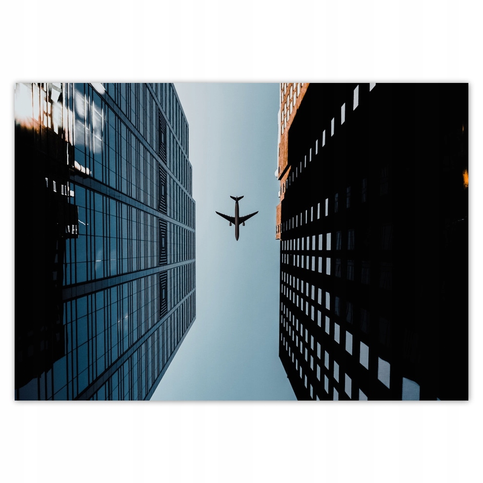 

Plakaty 100x70 Samolot między budynkami