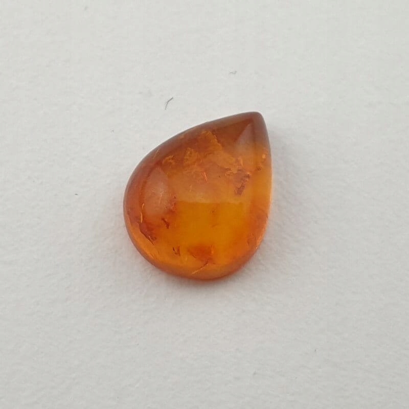 Bursztyn bałtycki kaboszon ~9x7 mm nr 417