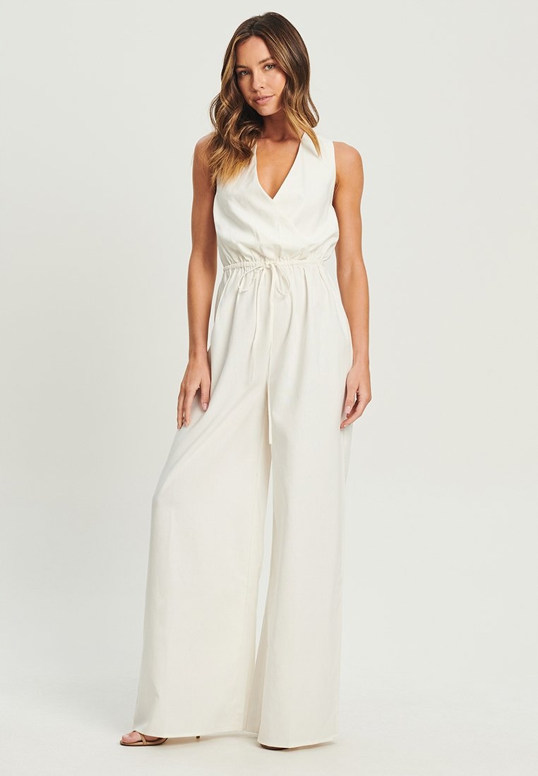 Letní krémová kombinéza s širokou nohavicí Tussah 38
