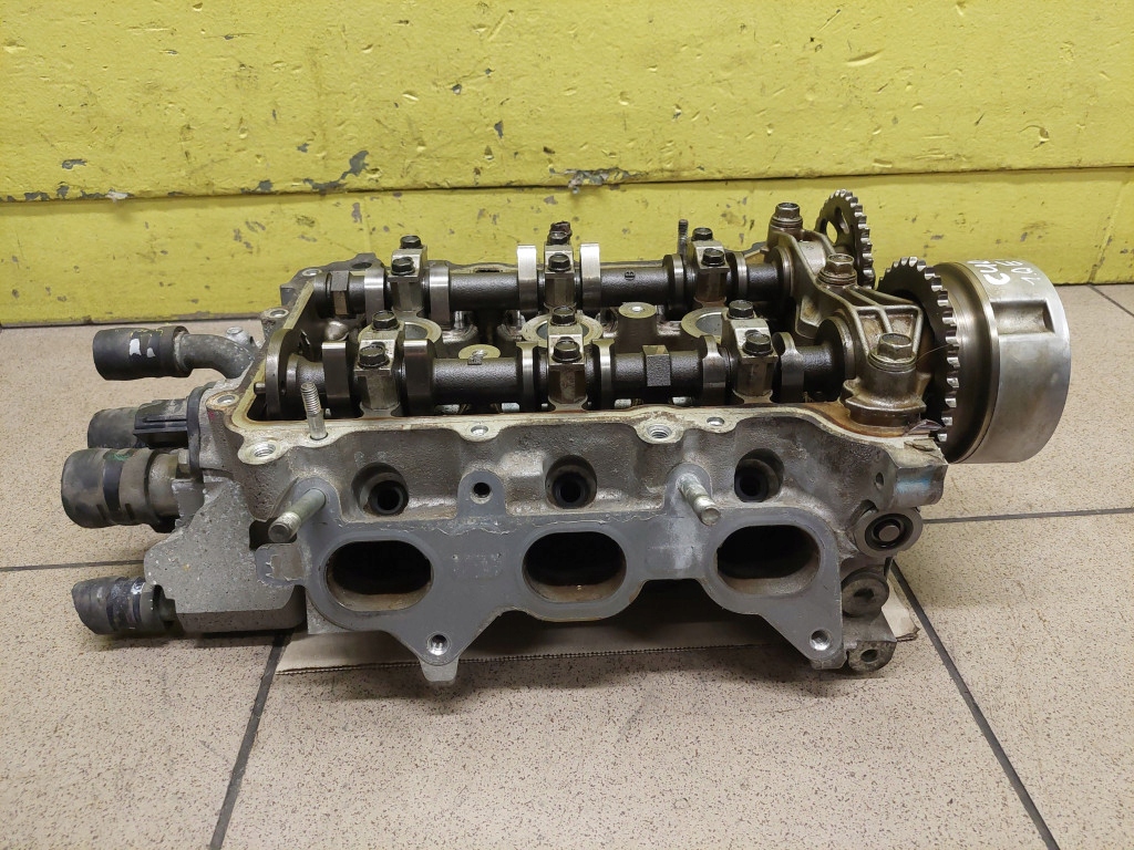 DAIHATSU CUORE 1.0 head. of the engine