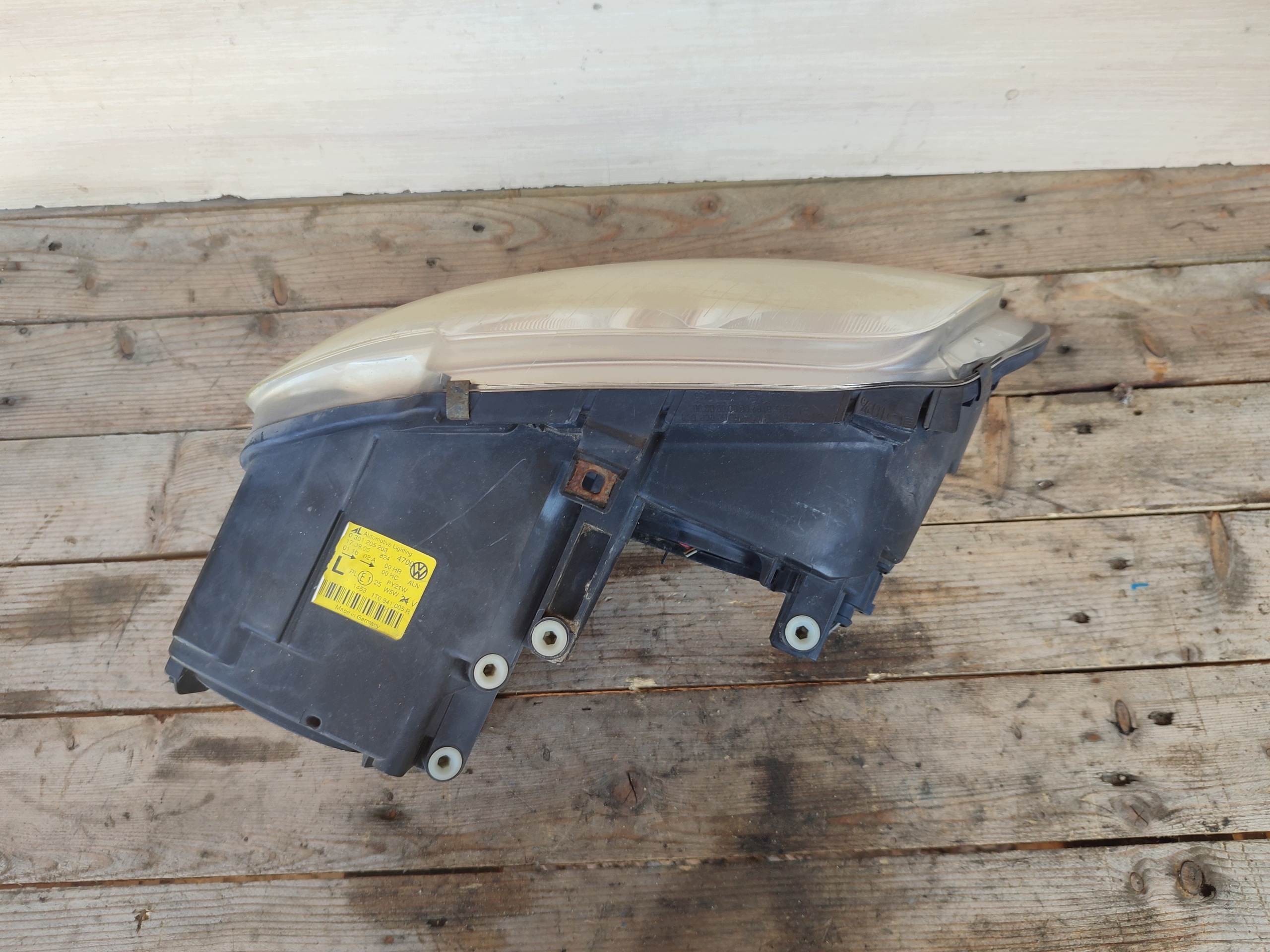 VW Touran and Reflektor left light oe 1T0941005R