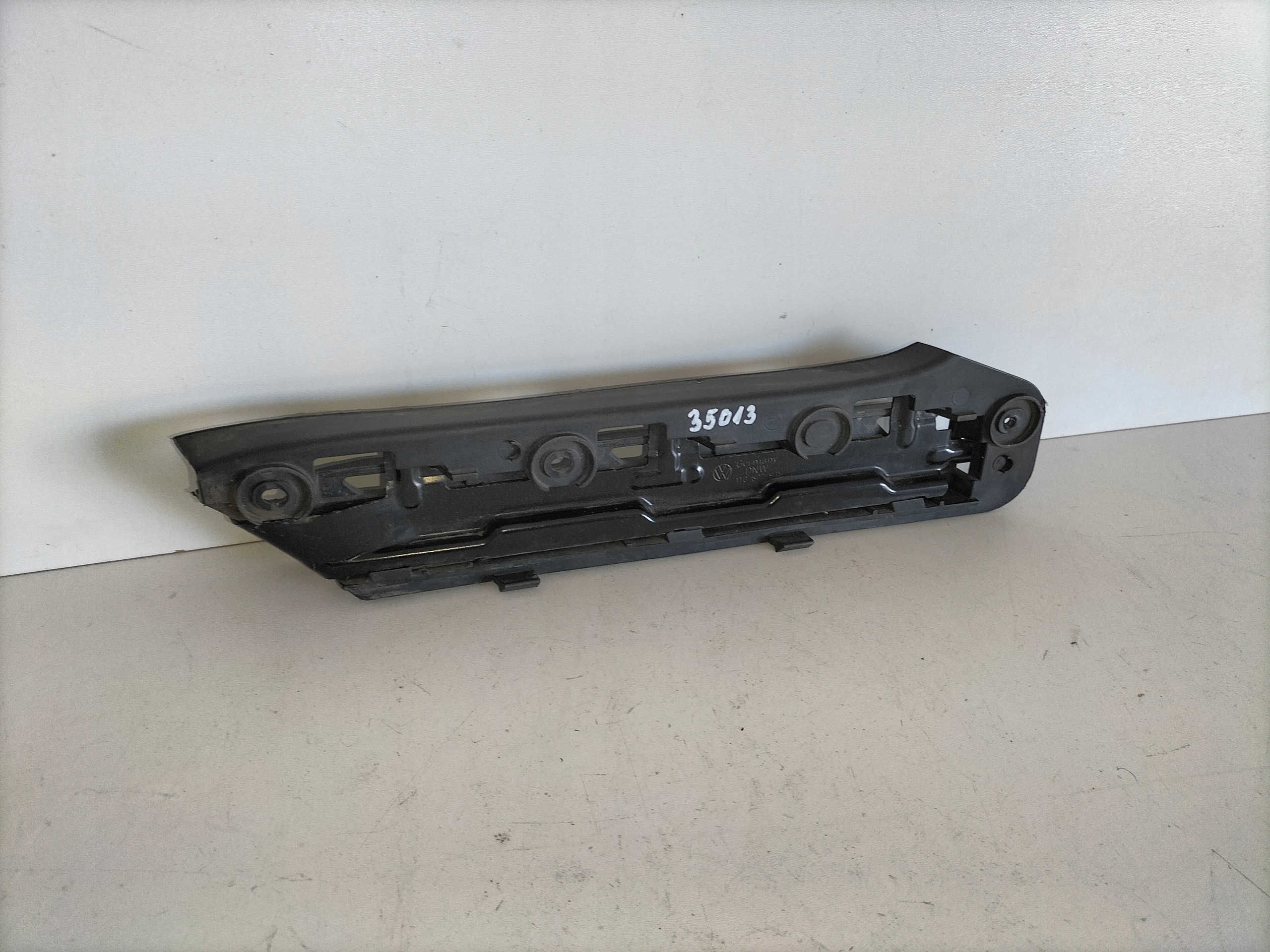 support holder of a bumper front left VW CADDY III 04-10
