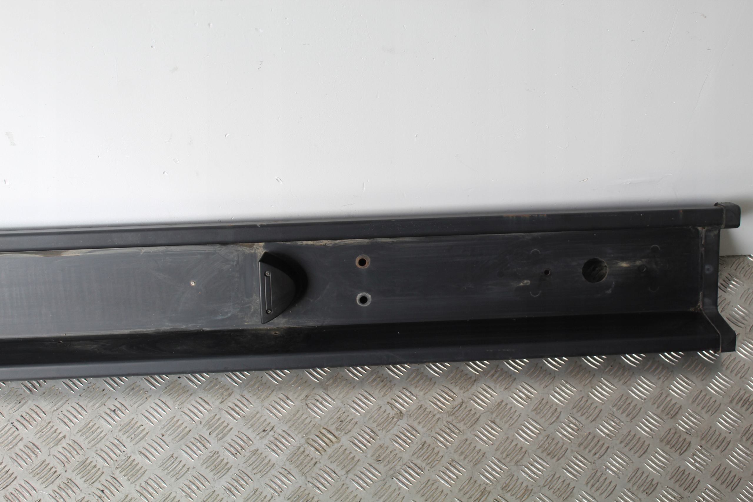 STOSSSTANGE TRÄGER HECK NISSAN NT500