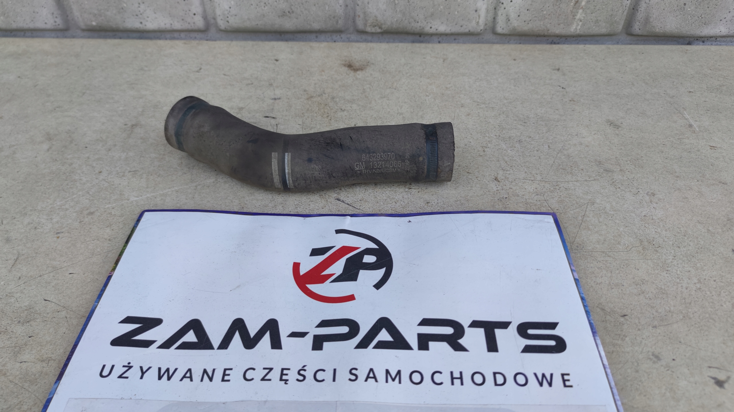 WĄŻ WLEWU PALIWA OPEL CORSA D 13214066