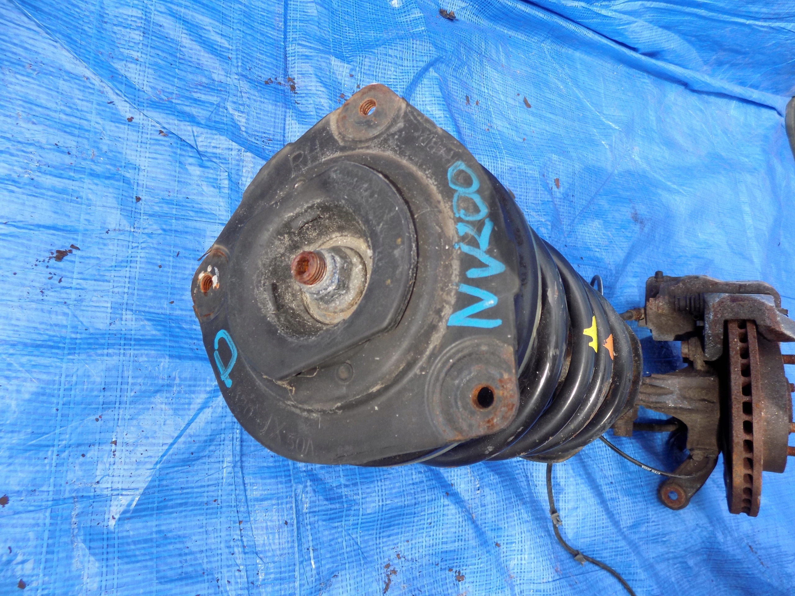 swing right front shock absorber NISSAN NV200 1,5
