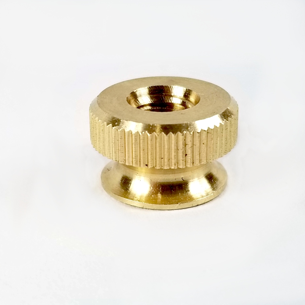 

Pokrętło mosiężne M8 przelotowe fi18mm nakrętka