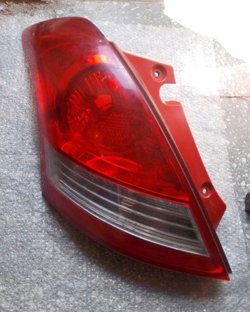 SUZUKI SWIFT MK7 SPORT 10- LAMPA TYLNA LEWA EUROPA ORYGINAŁ
