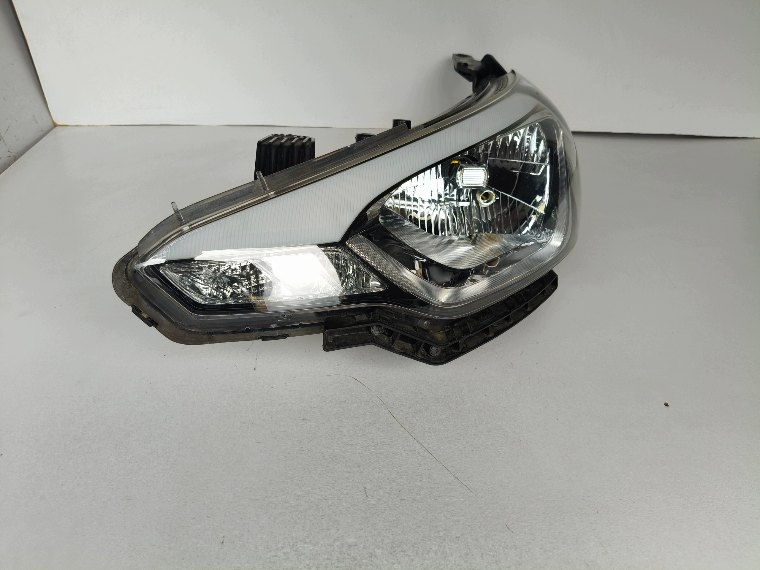 light left REFLEKTOR HYUNDAI I20 II 14