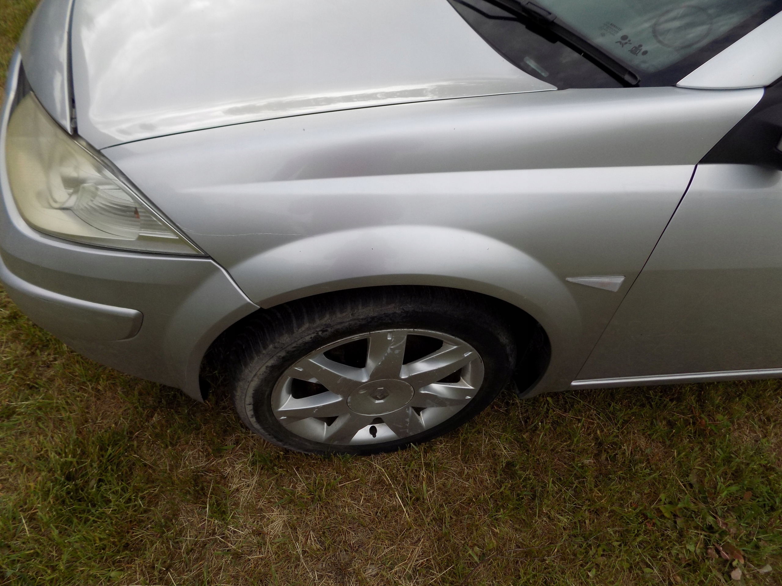 MEGANE CABRIO II 2 BŁOTNIK LEWY PRZÓD TED69