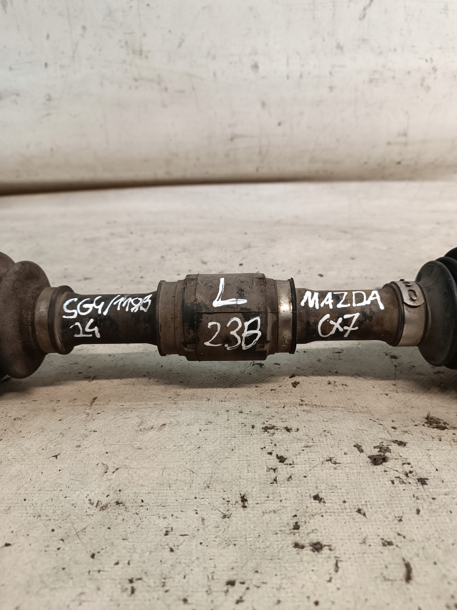 Mazda CX-7 semi-axis left front manual 4X4 2007r 2.3B