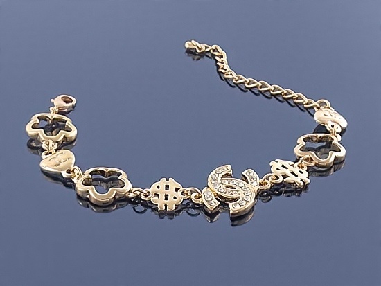 

Złota bransoletka Charms