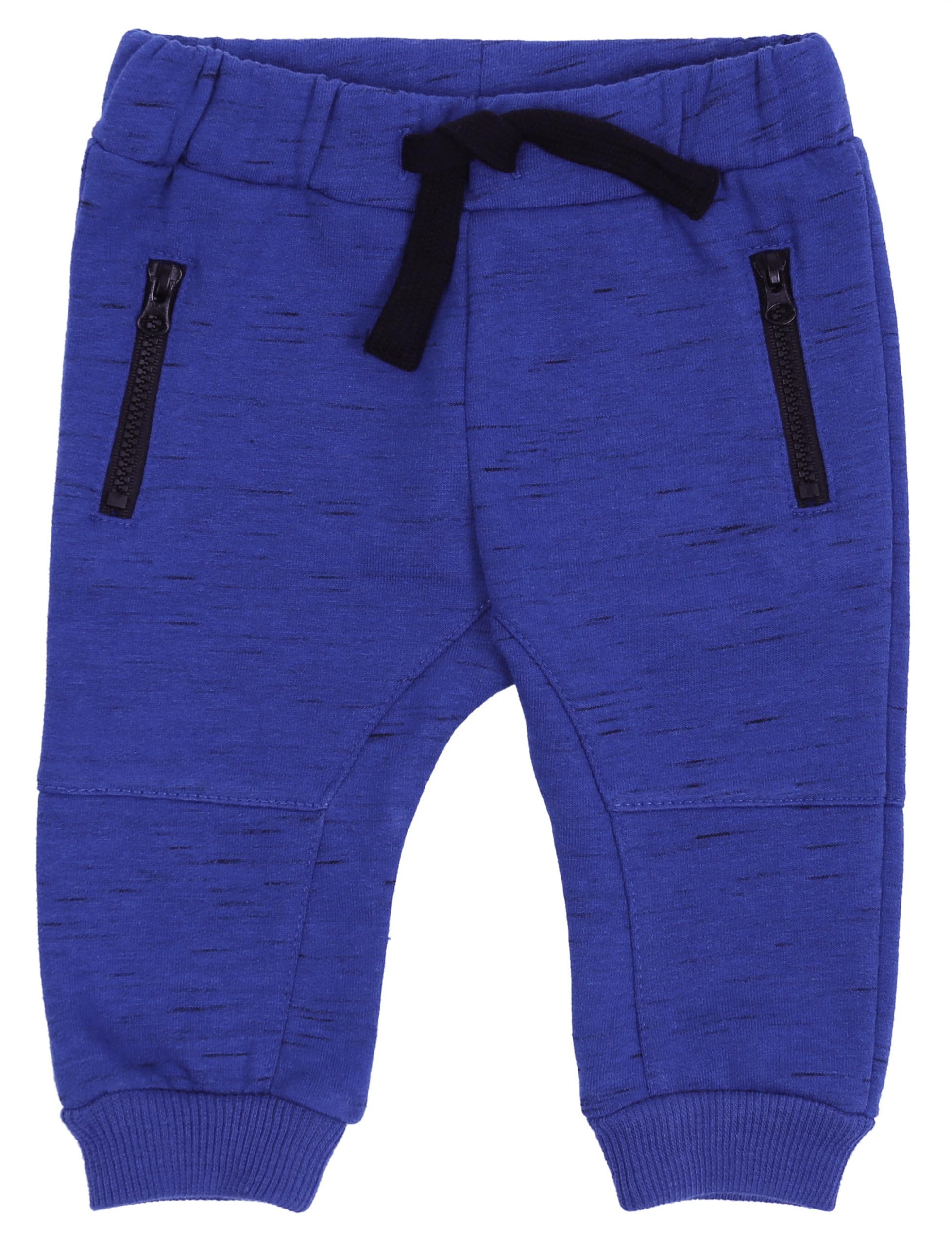 

Niebieskie spodnie dresowe Primark 3-6 m 68 cm