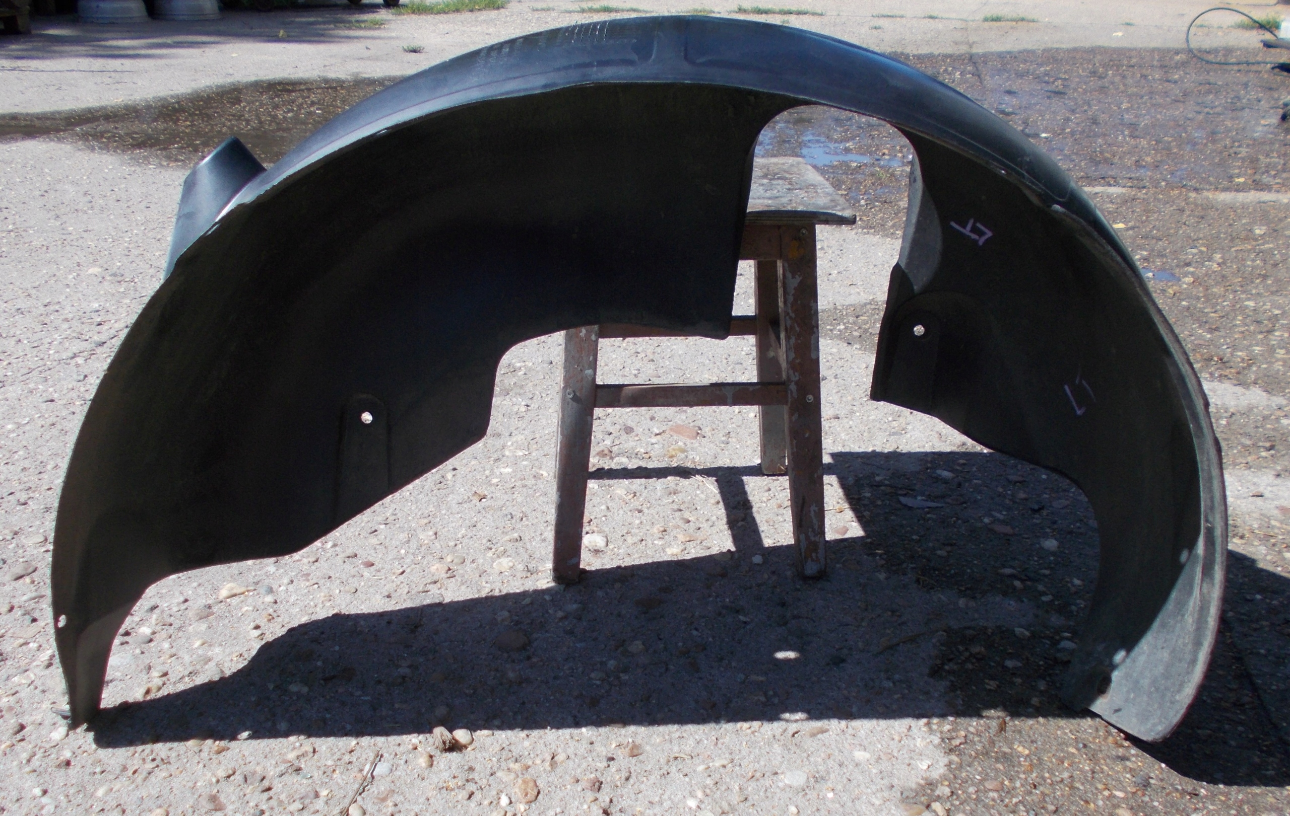 BMW X3 E83 3.0D 08R mudguard left rear part 3400057