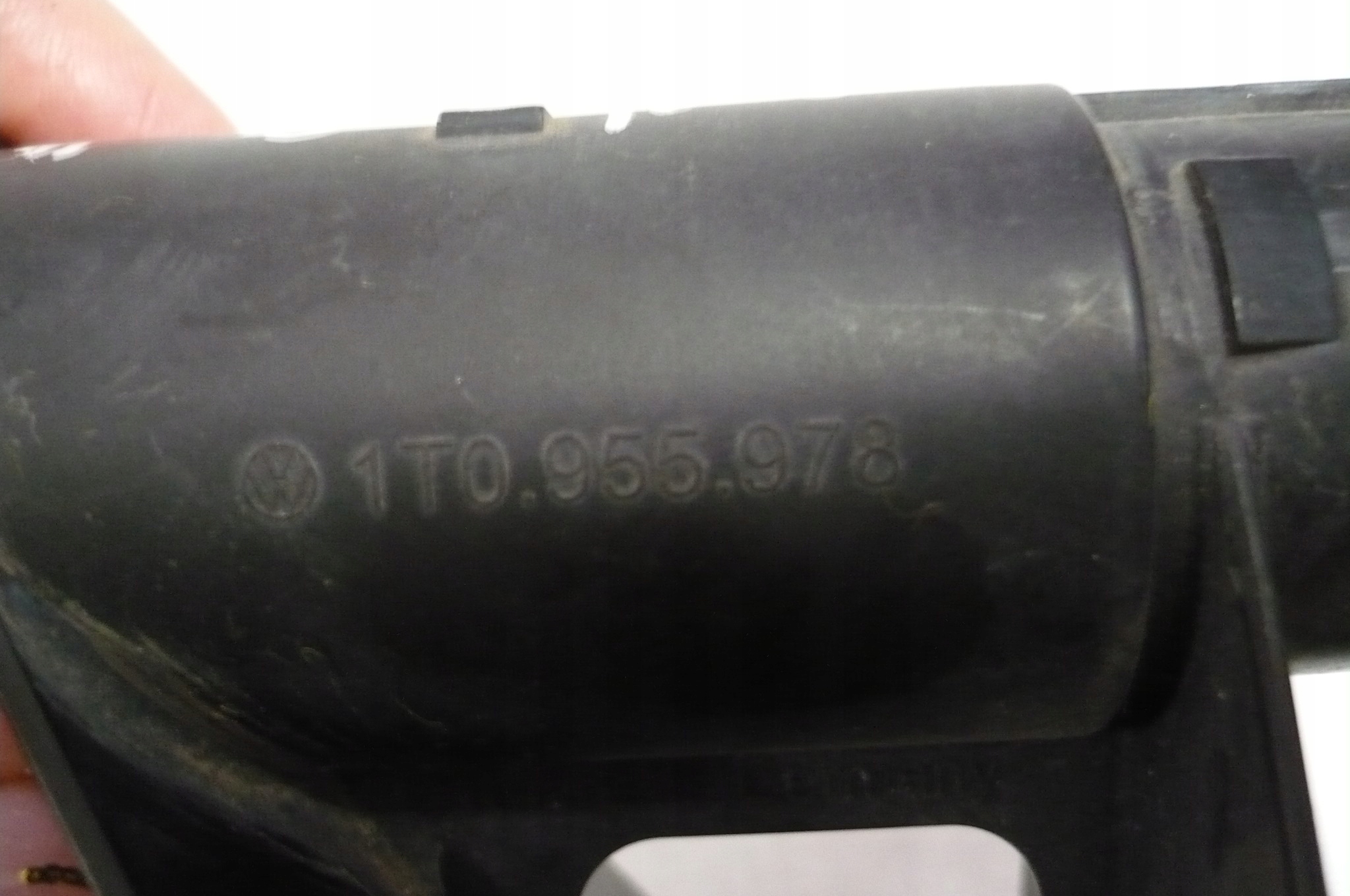 VW TOURAN 1 03-06 washer REFLEKTORA left original