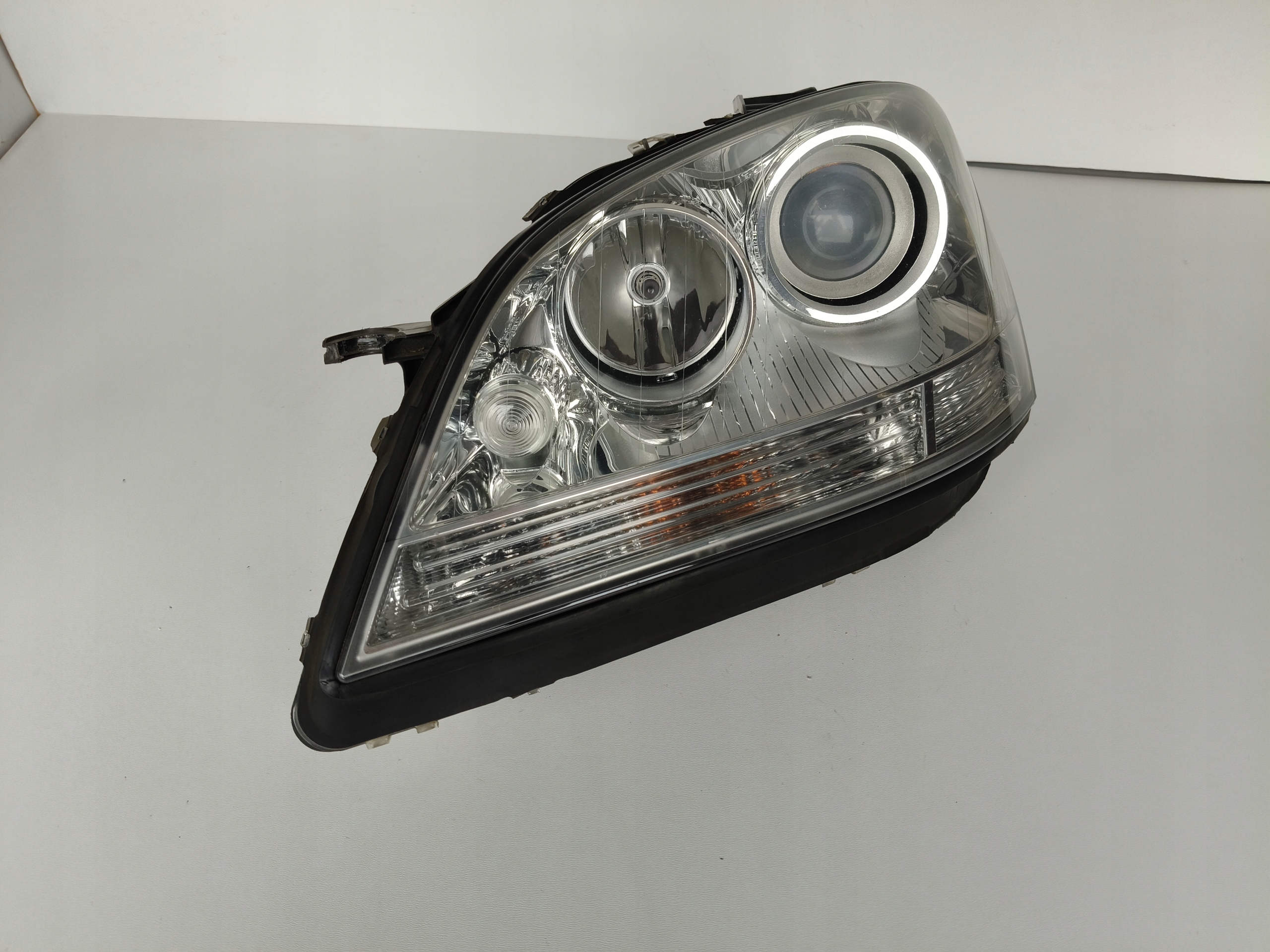 light left REFLEKTOR MERCEDES ML W164 05-08