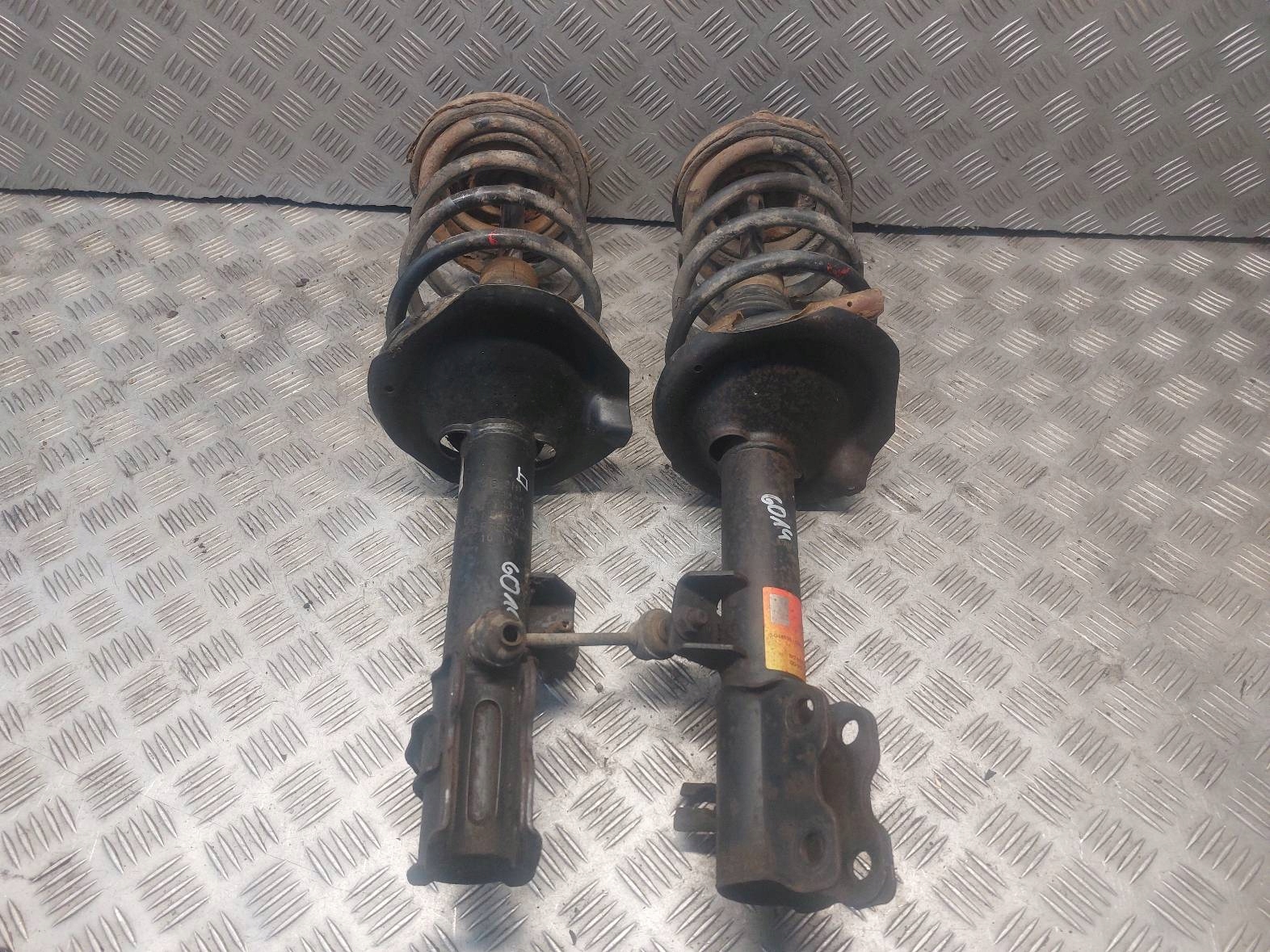 shock absorber + spring left front + right front NISSAN X-TRAIL and