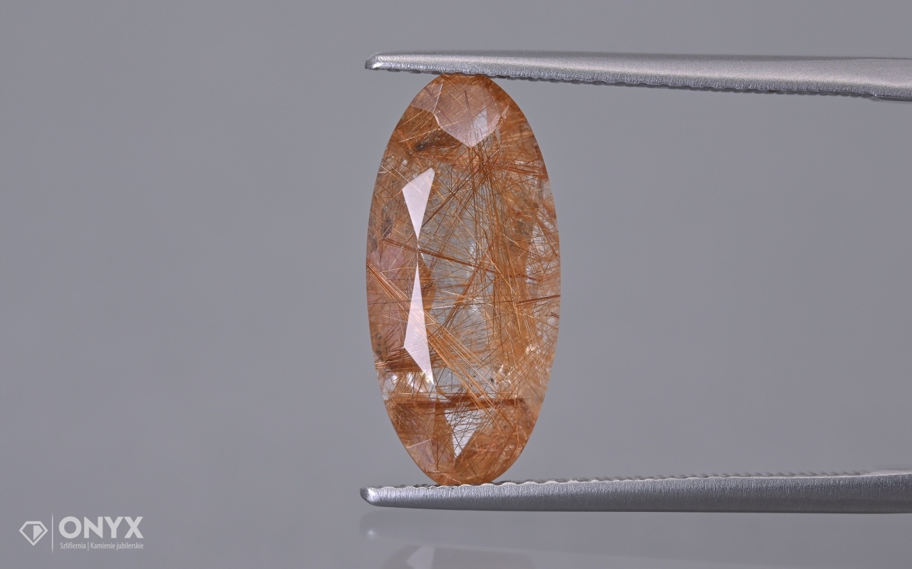 Křemen s rutilem fazetovaný ovál 16,5x7,5 mm