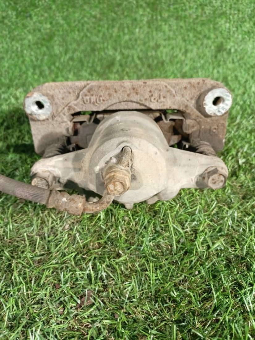caliper brake rear part left side Subaru Outback 4 2010