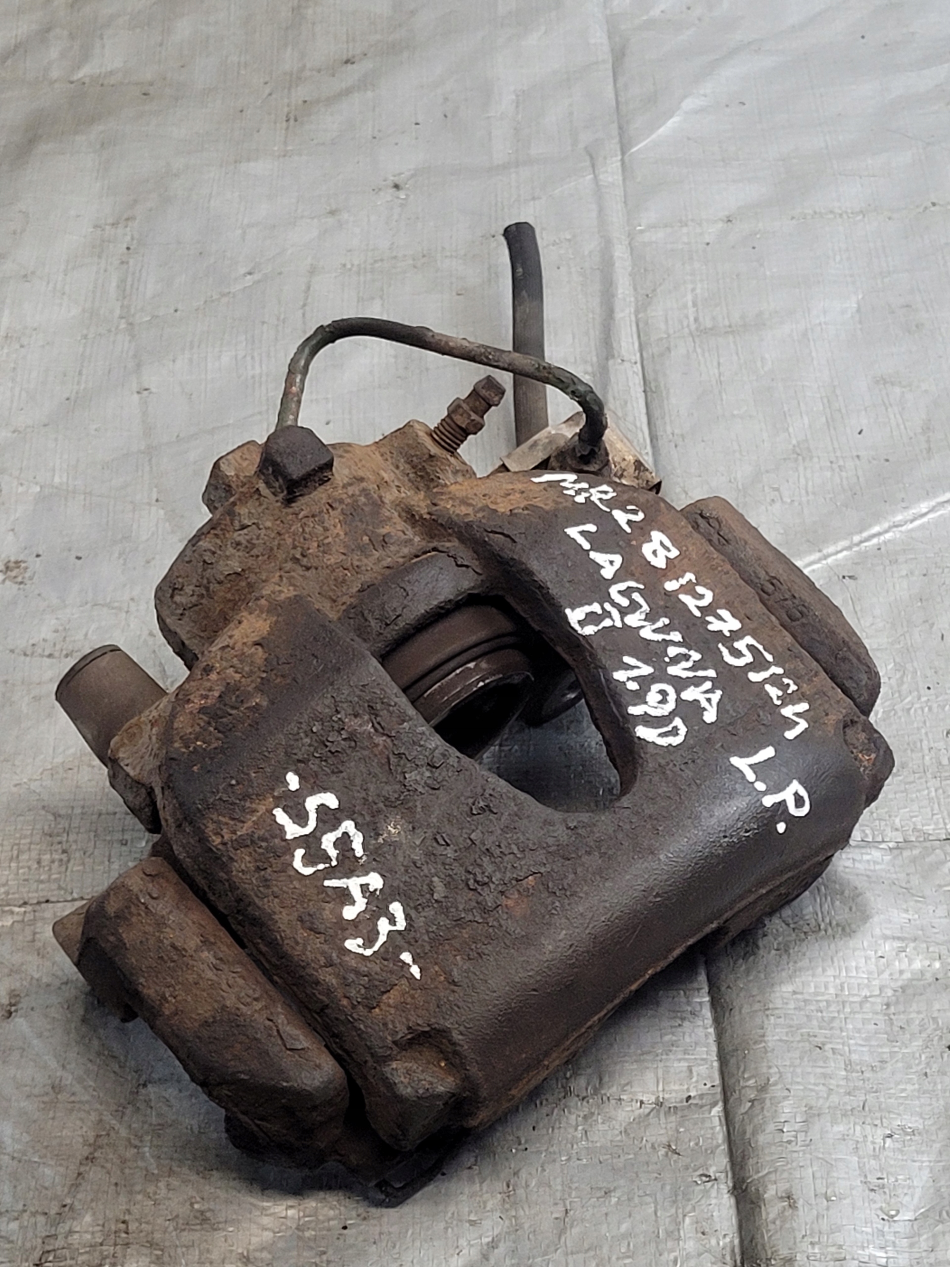 caliper brake left front + caliper carrier RENAULT LAGUNA II 1.9 DCI 02r.