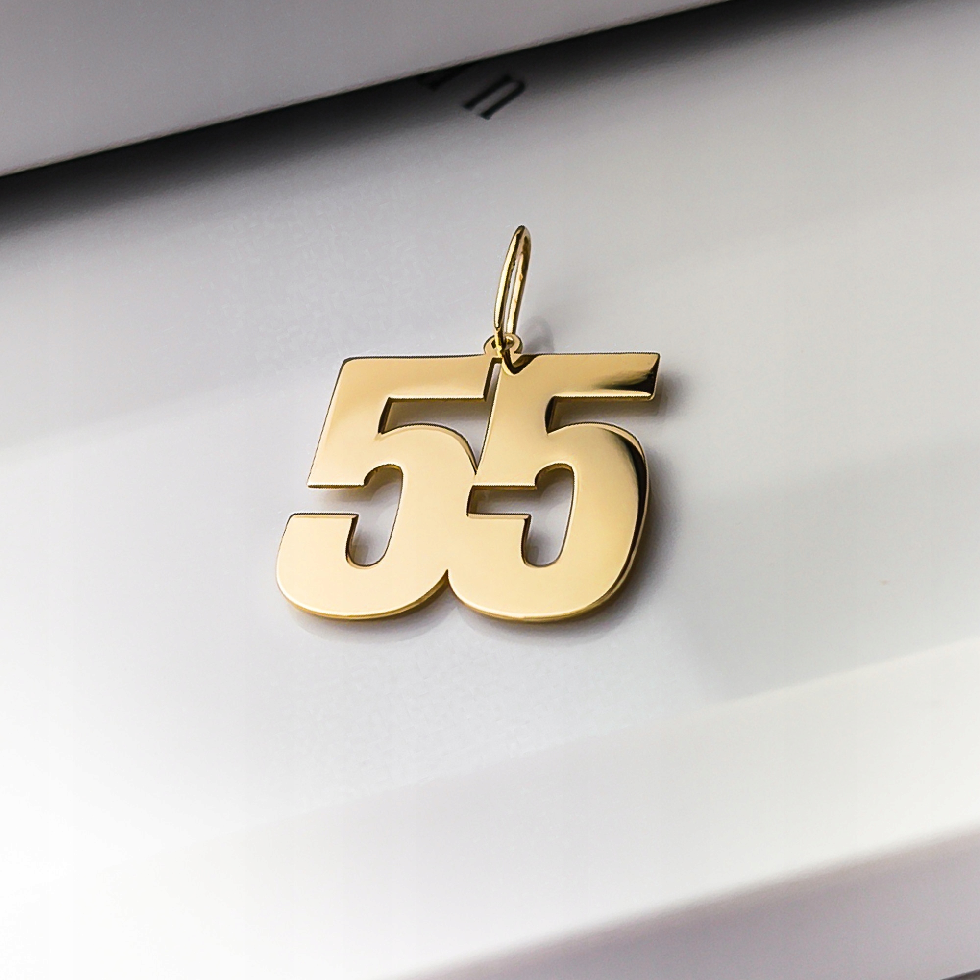 Zlatý přívěsek – číslo 55 – pr.585