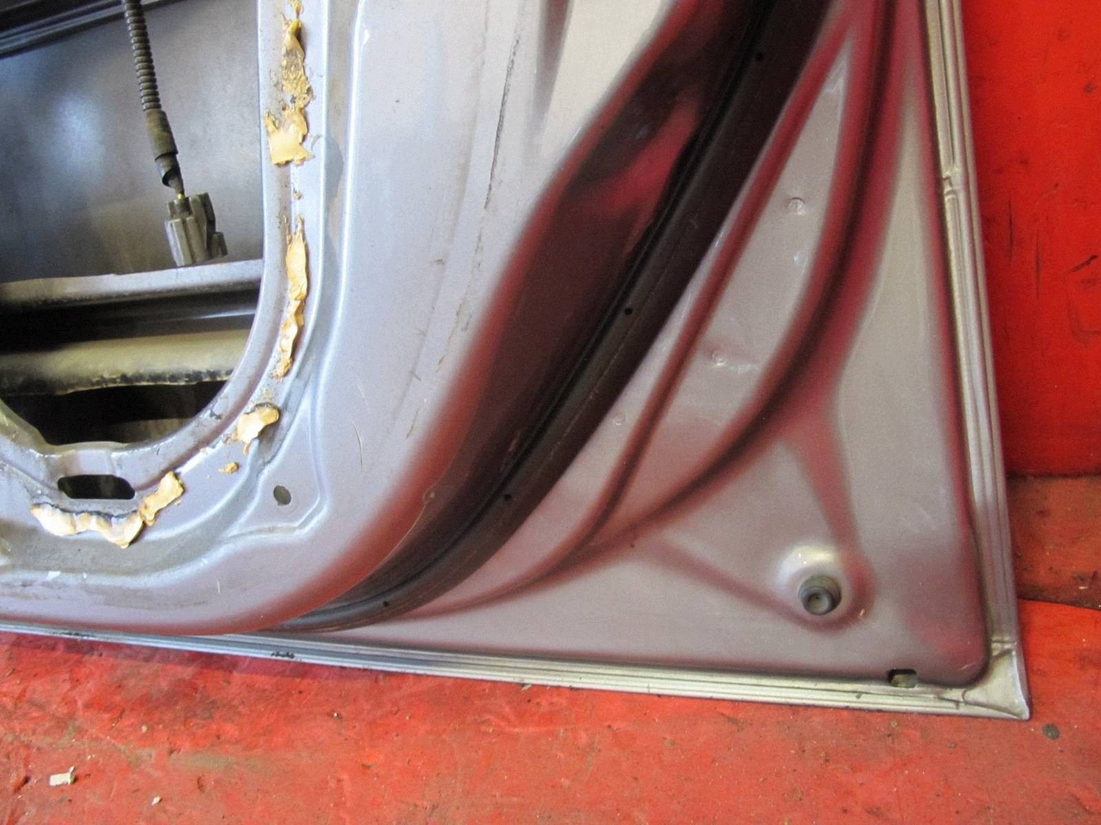 Honda Jazz 2 II GE2 02- door right front front grey NH642M