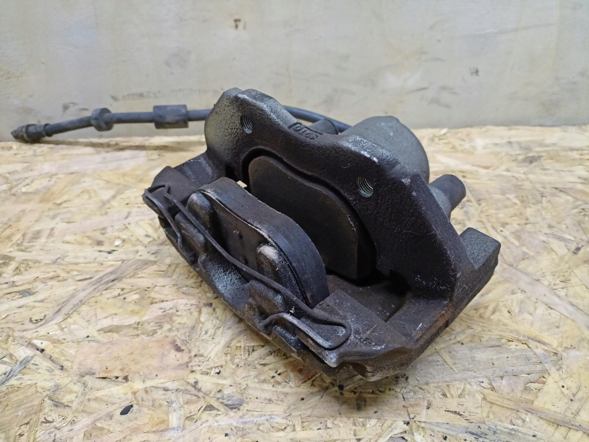 caliper brake front left side Mazda 5 2 2011 0451