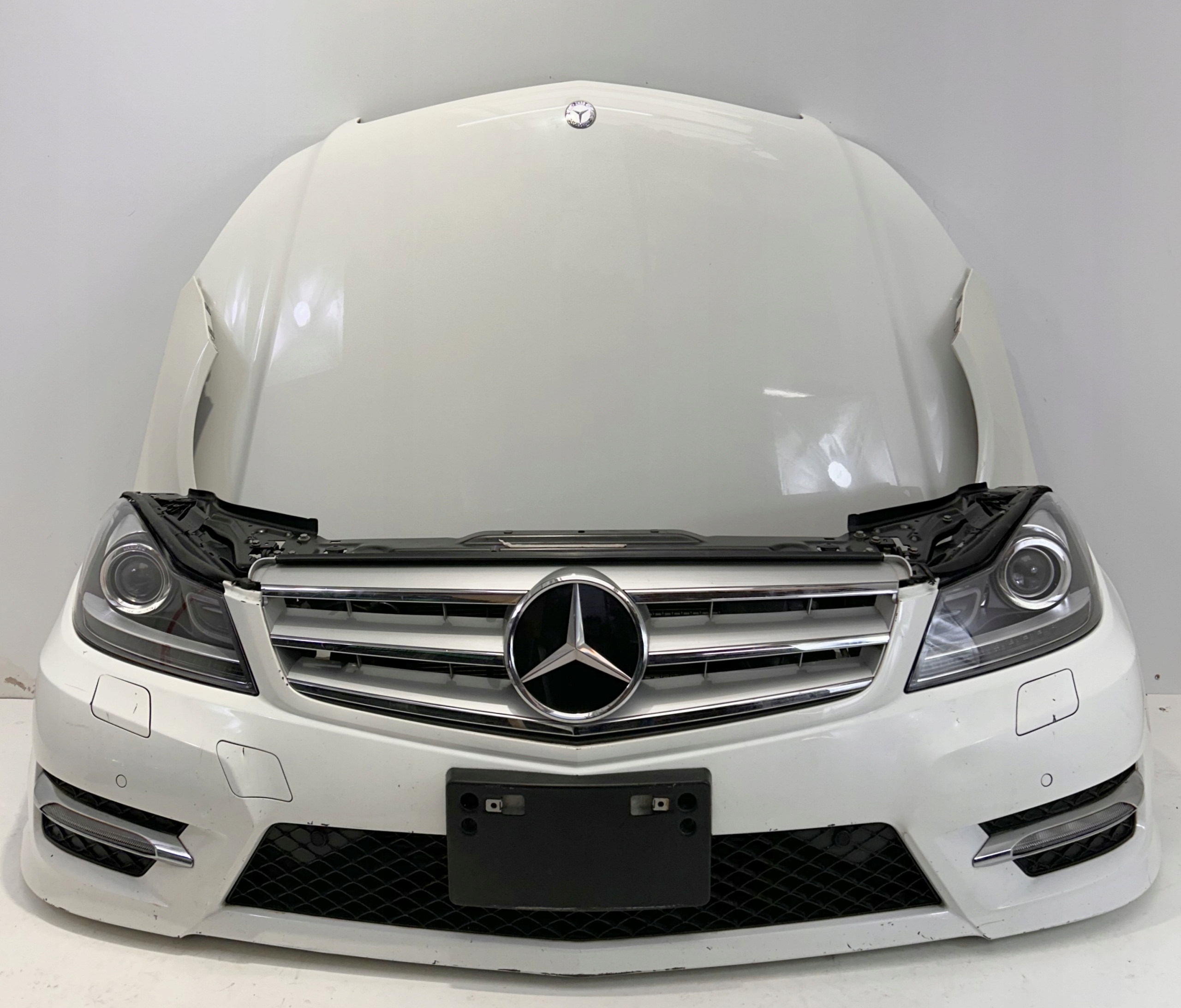 MERCEDES W204 LIFT AMG ZDERZAK MASKA BŁOTNIK PAS
